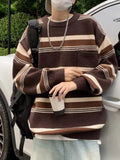 Men's Striped Knit Dropped Shoulder Sweater by Trendsi