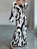 Abstract Print Long Sleeve Maxi Dress by Trendsi